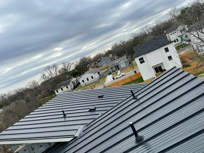 Standing seam metal roof panels with vents for Skylight Repair in Oak Brook